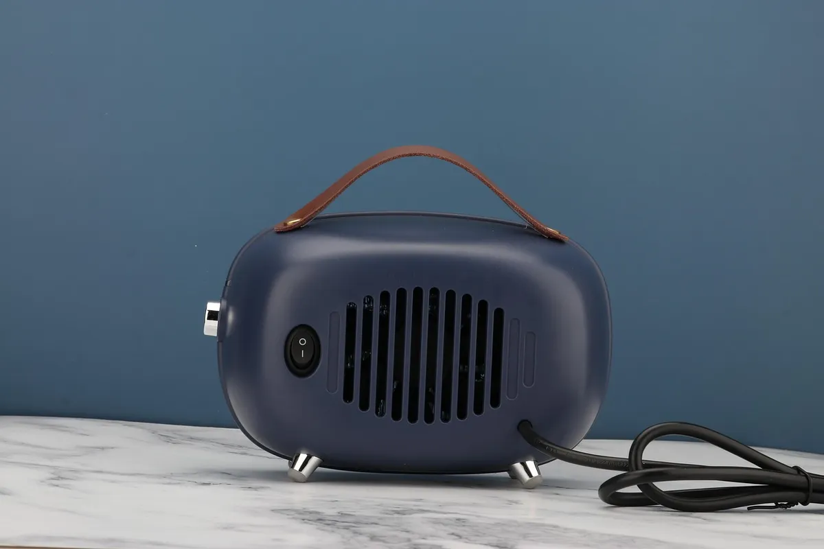 Portable heater and fan set up in a bedroom for bed bug heat treatment