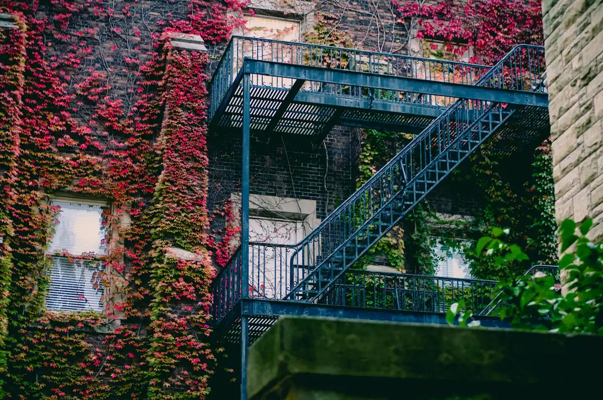 Older brick apartment building with front steps in an Ohio city