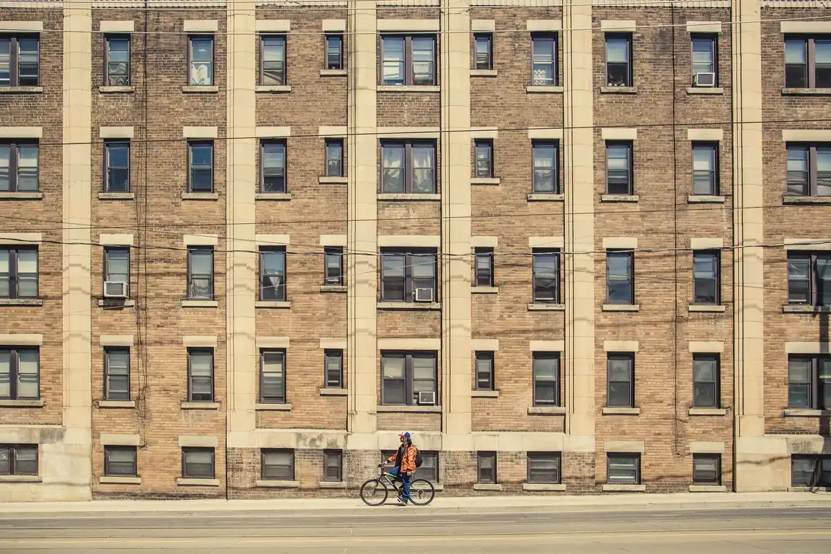 Older brick apartment building on a residential street