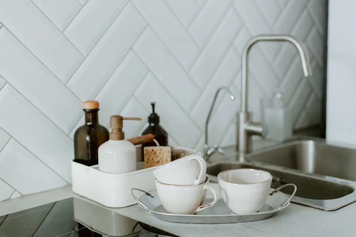 Clean kitchen counter and sink in an older home