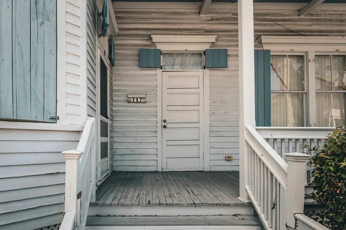 Older wood-frame house with siding and a front porch